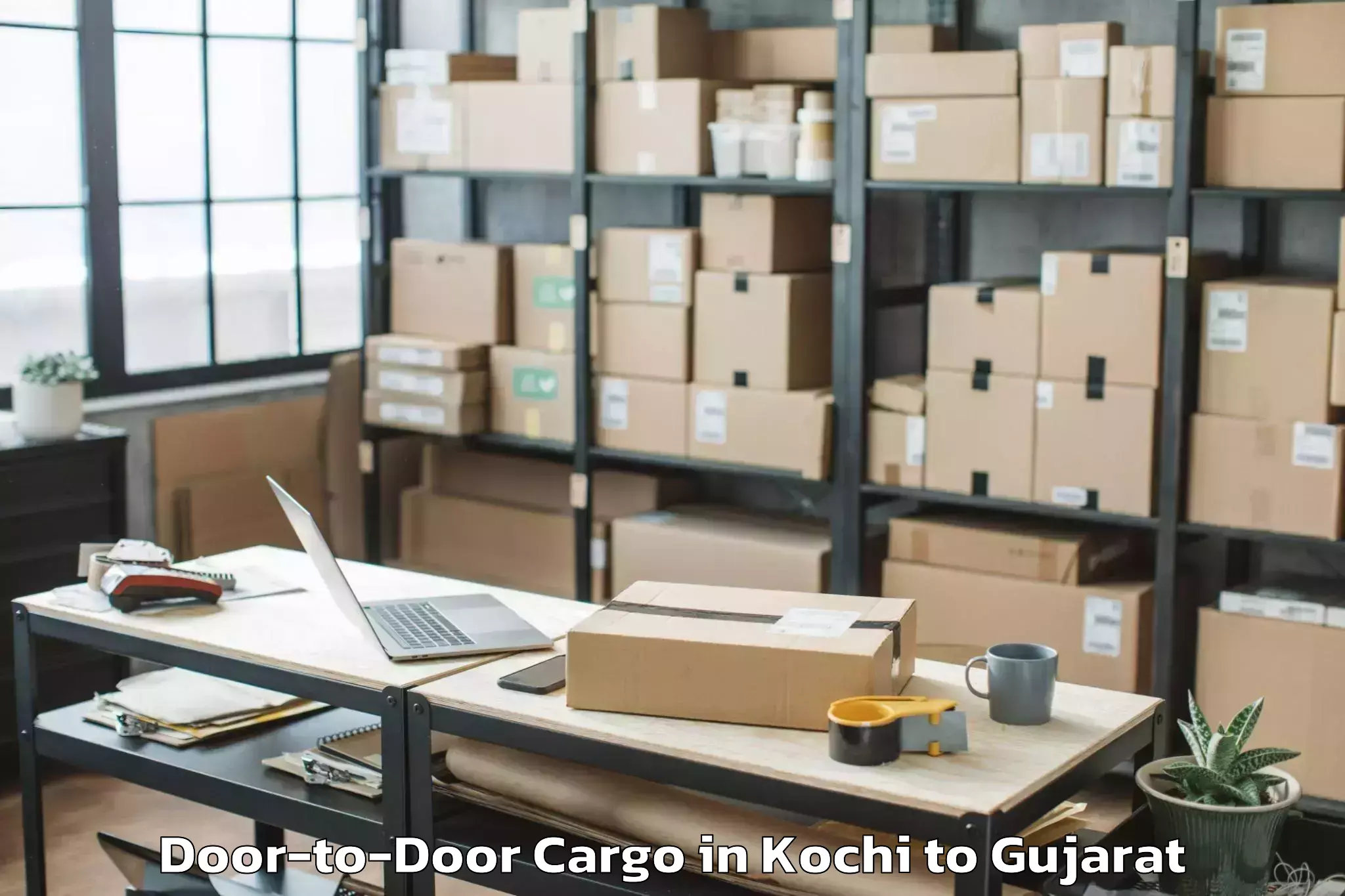 Reliable Kochi to Khambhaliya Door To Door Cargo